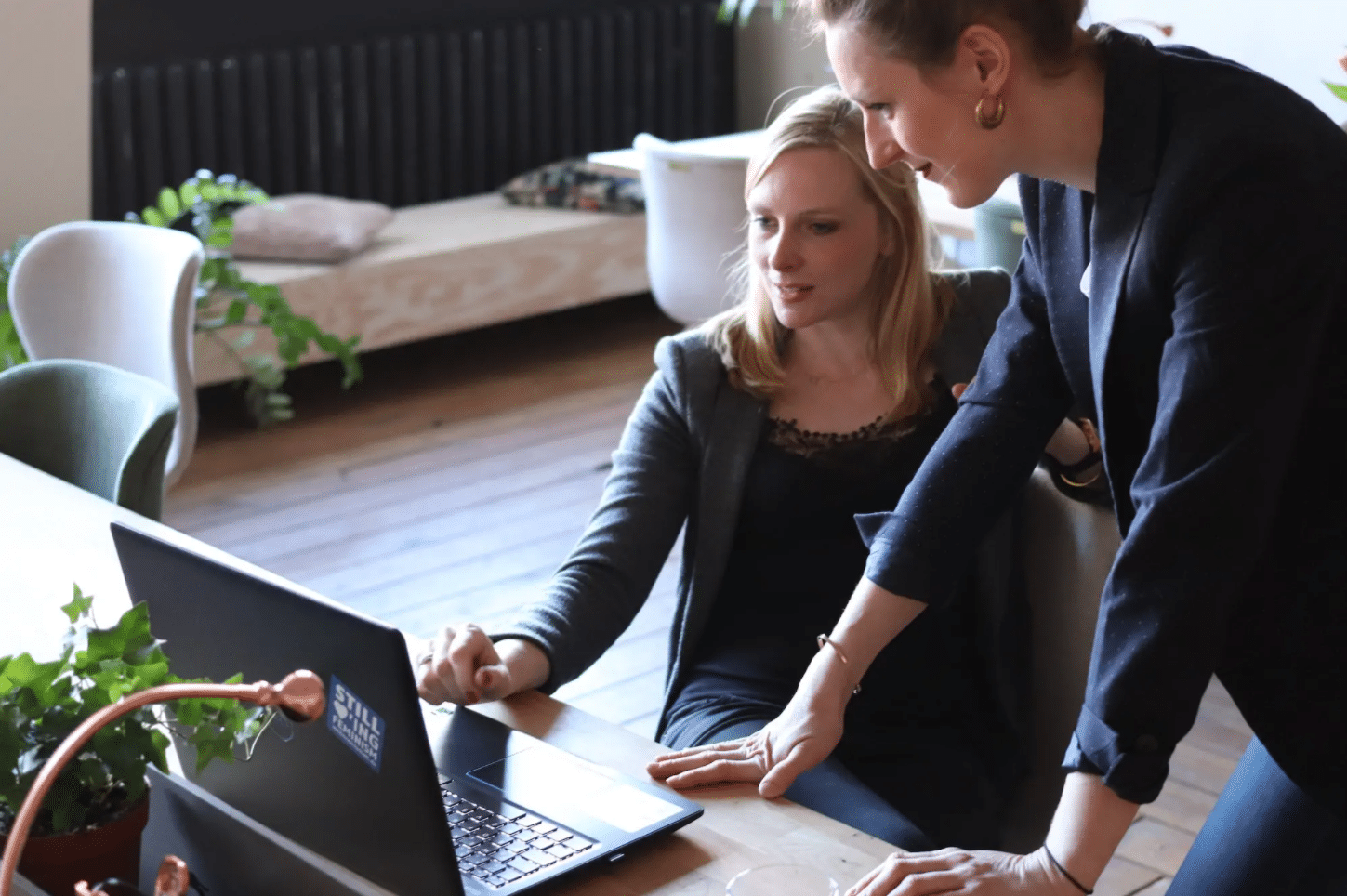 two managers discuss learning and development strategy